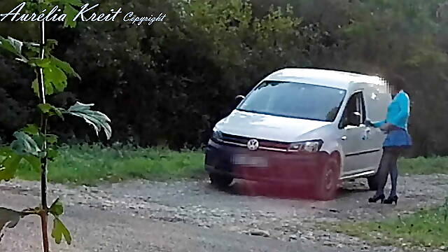 Outdoor car windows cleaning by the road